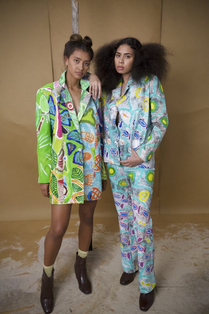 Indigenous Fashion Design label Yarrabah, colourful blazers and a suit modelled by Aboriginal and Torres Strait Islander women
