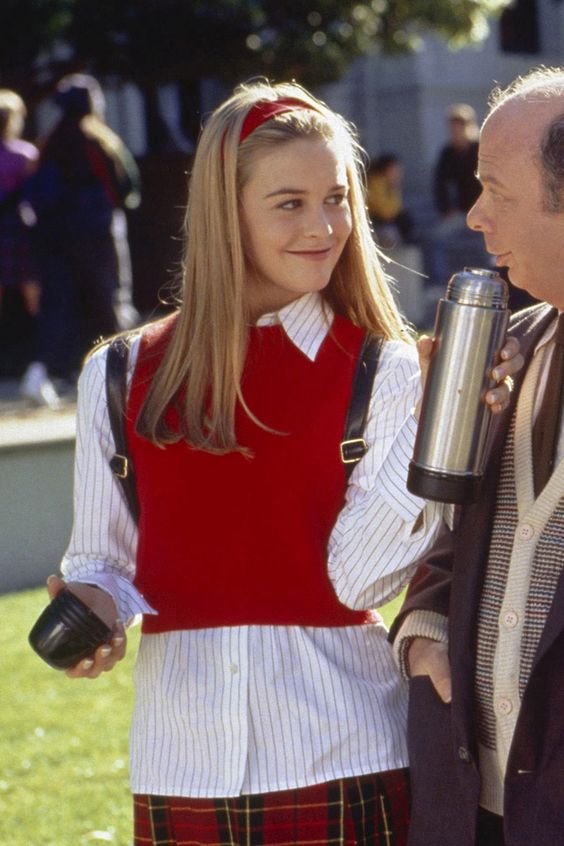 scene from Clueless showing red sweater vest