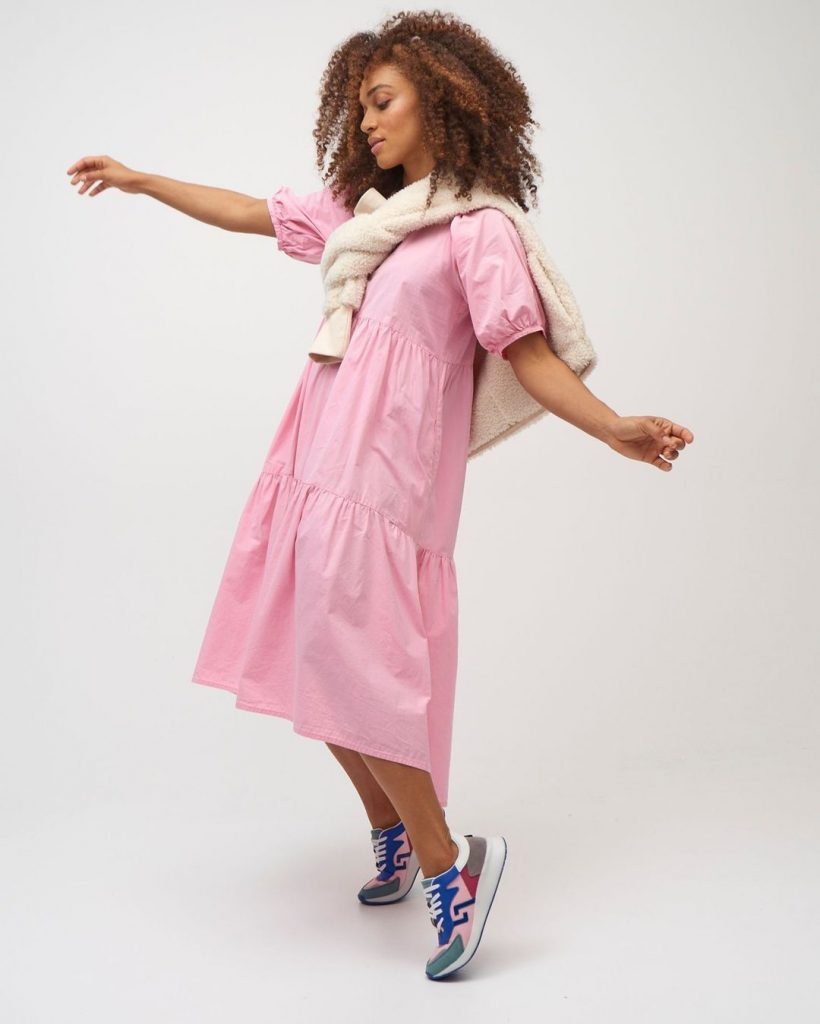 Best sneakers - Rollies worn by woman in pink dress